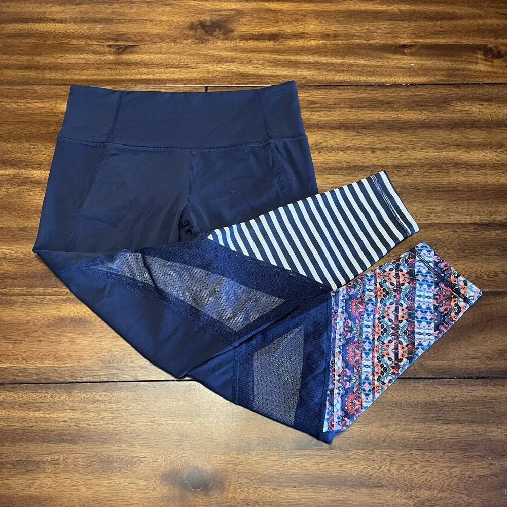 ATHLETA MIXED PRINT SALUTATION 7/8 TIGHT SIZE M